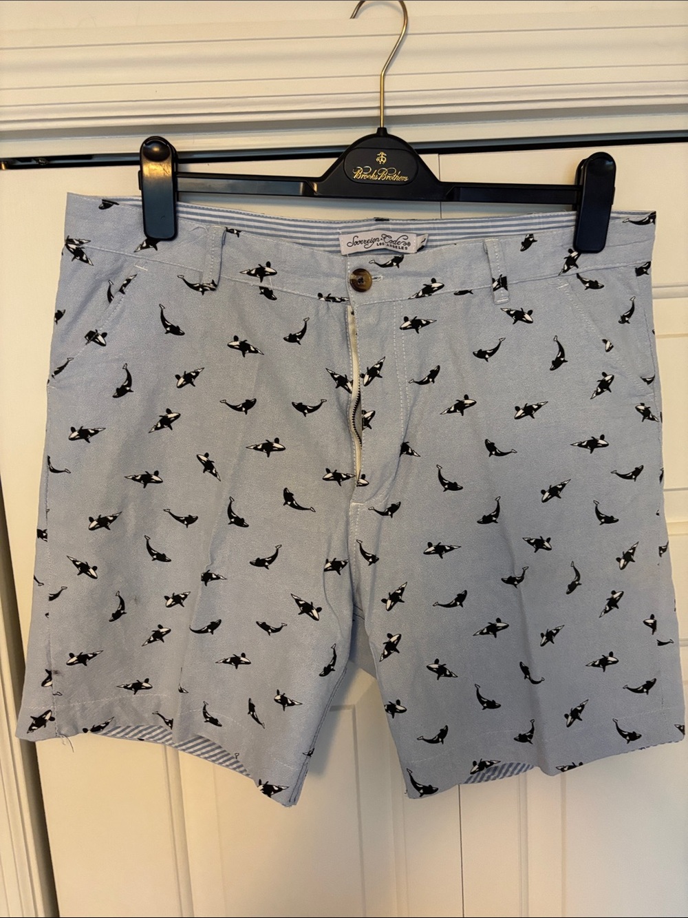 Sovereign Code Light Blue Swim Trunks with Black Whale Print